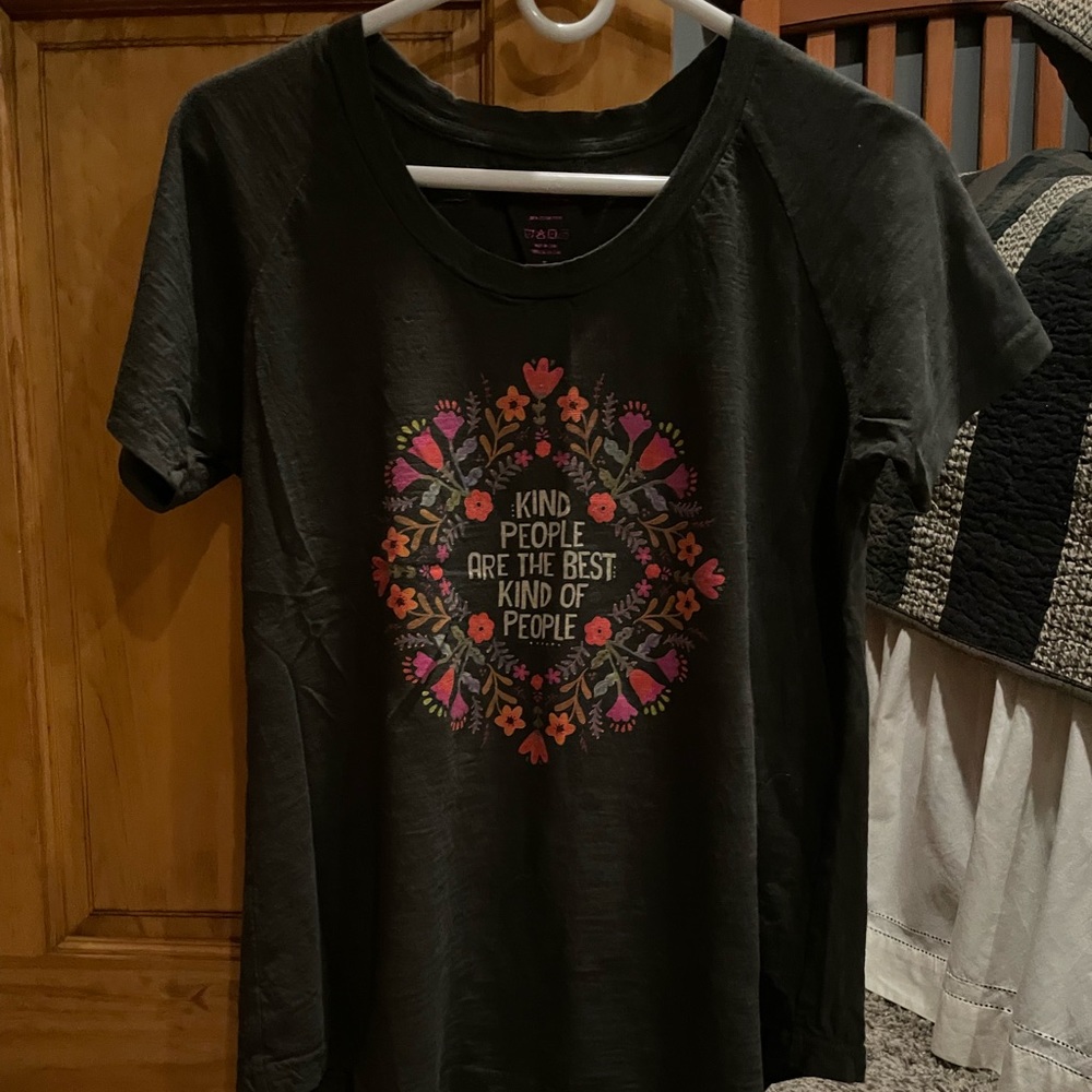 Women’s size large Naturals Tshirt. Color is dark green